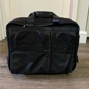Tumi rolling briefcase - great condition